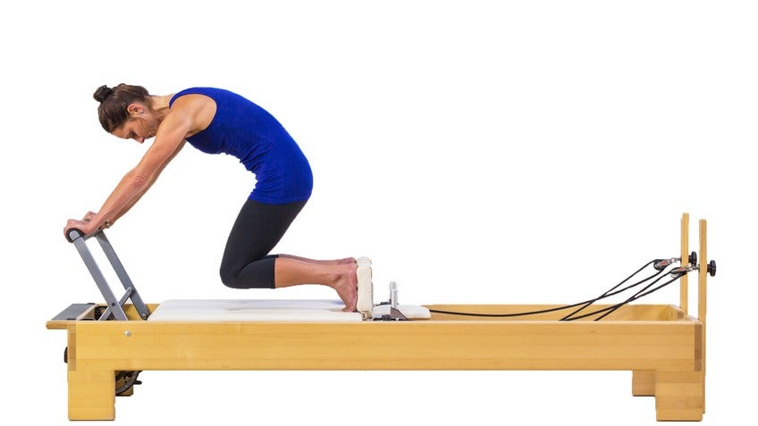 Pilates Spine Stretch Forward through Saw with Juli - Pilates Workouts -  Onelife Anywhere