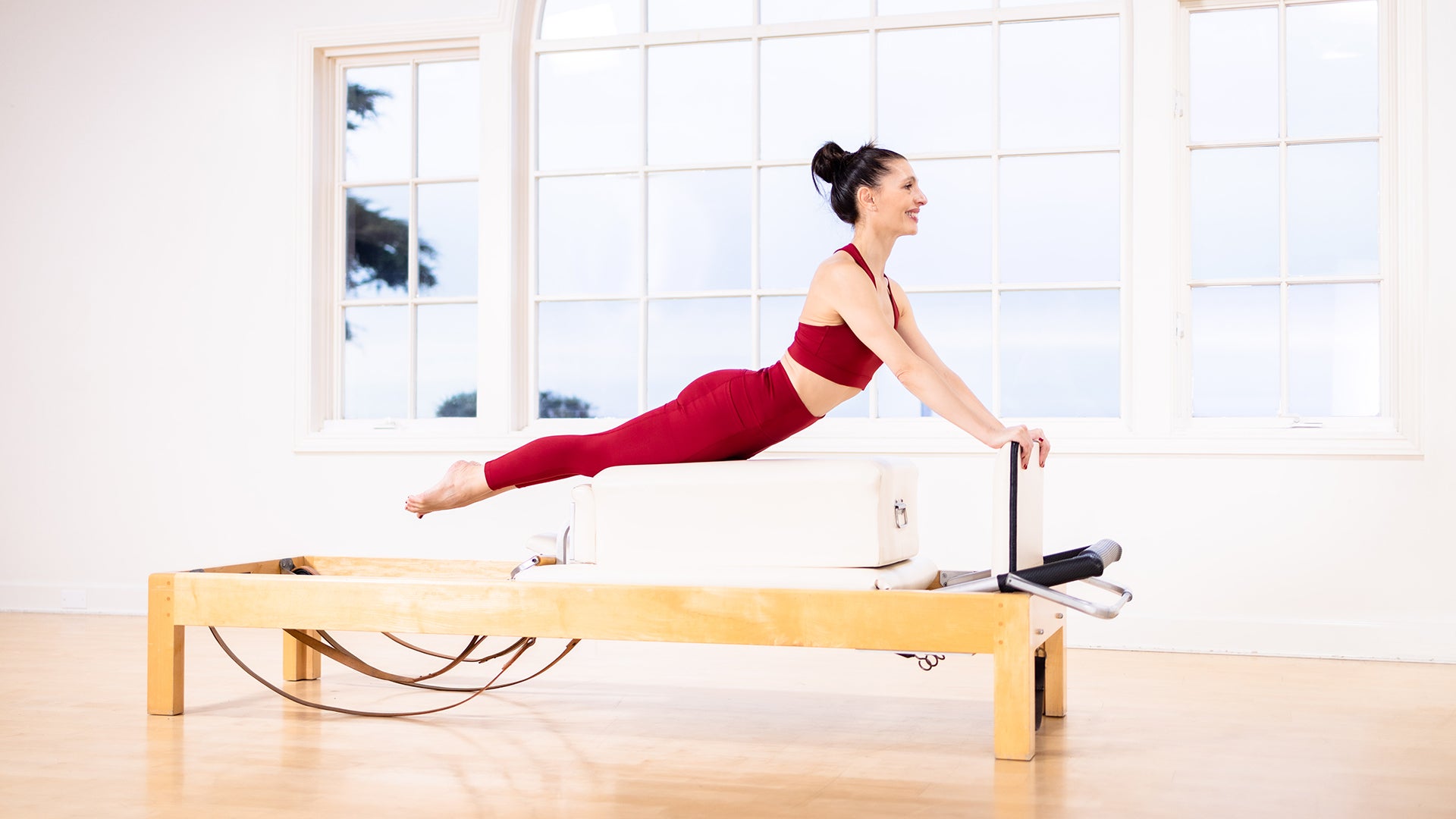 Reformer Pilates Photography - Feet In Straps Exercise